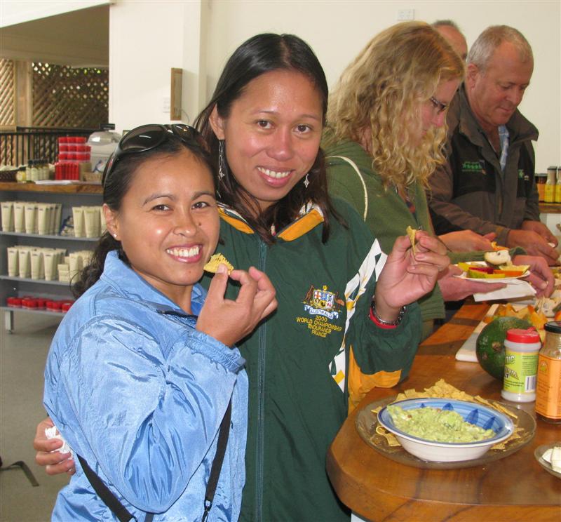 Paning and Josie Tasting Fruit